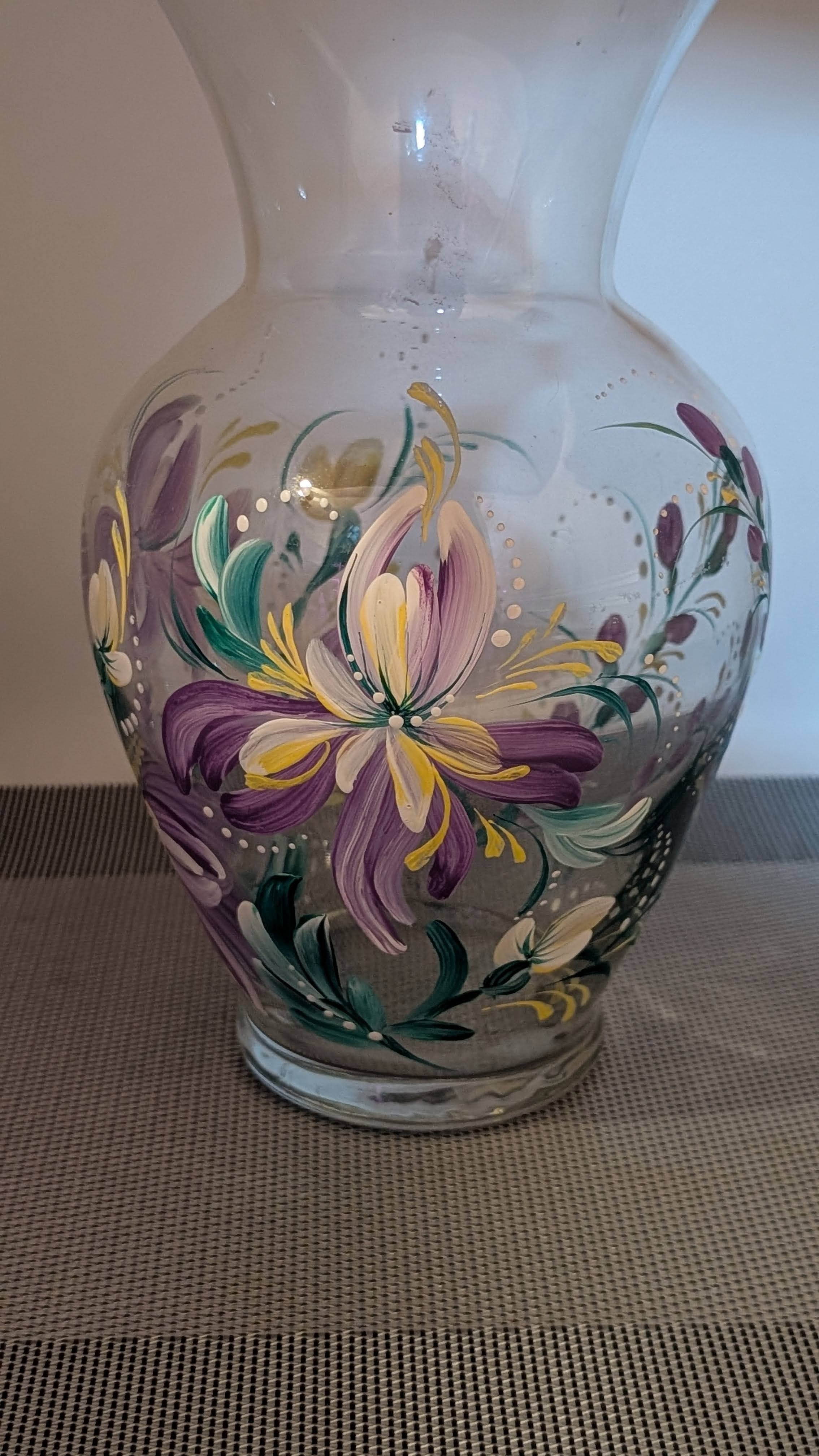 Glass vase with purple and yellow florals
